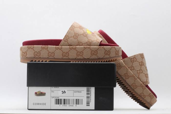 G*u*i slippers